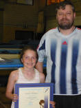 Lauren Michaels receiving JP award from Phil Gibbs, Club Secretary