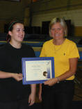 Natalie Shade receiving JP award from committee member, Marie Merritt